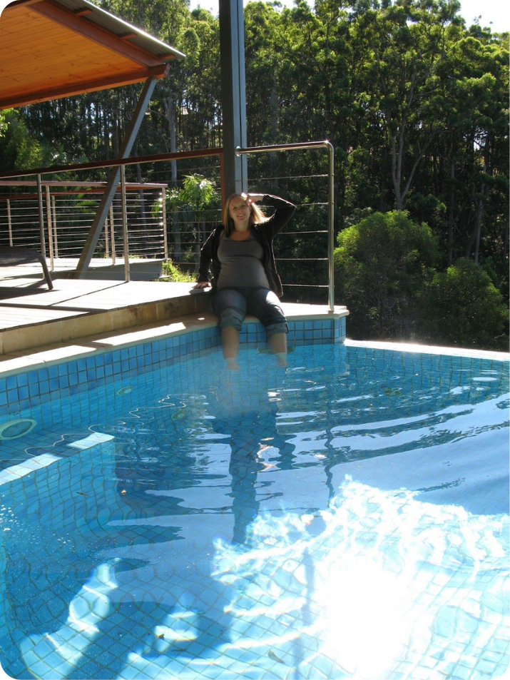 Pregnant woman by pool